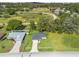 Aerial view of the house showing its location with surrounding properties and ample yard space at 14605 Sw 20Th Pl, Ocala, FL 34481