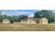 Single-Gathering home with a detached garage and plenty of yard space at 21353 Sw Beach Blvd, Dunnellon, FL 34431