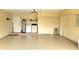 Spacious garage with epoxy flooring and laundry area, offering ample storage space at 21353 Sw Beach Blvd, Dunnellon, FL 34431