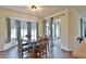 Inviting dining room with ample natural light and sliding glass door access at 2209 Nw 55Th Avenue Rd, Ocala, FL 34482