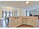 Bright kitchen with stainless steel sink, dishwasher, and adjacent dining area at 2209 Nw 55Th Avenue Rd, Ocala, FL 34482