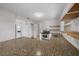 Bright kitchen with stainless steel appliances, white cabinets, and granite countertops at 2923 Se 14Th St, Ocala, FL 34471