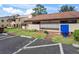 Exterior view of a building with mailboxes and parking area at 3437 E Fort King St # 220, Ocala, FL 34470