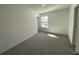 Comfortable bedroom with soft carpet, bright window and a closet for storage at 3969 Ne 30Th Ter, Ocala, FL 34479