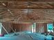 Interior view of a house under construction showing exposed framing and support beams at 46 Malauka Dr, Ocklawaha, FL 32179