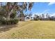 White home with green awnings and large green lawn at 4620 Nw 84Th Ter, Ocala, FL 34482