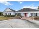 Beautiful home with black shutters, brick accents, and manicured landscaping provides a welcoming curb appeal at 4620 Nw 84Th Ter, Ocala, FL 34482