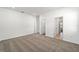 Neutral bedroom featuring gray carpet, several doorways, and recessed lighting at 5589 Sw 78Th Ave Rd, Ocala, FL 34474