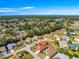 Attractive aerial view of a peaceful community with lush greenery, mature trees, and well-maintained lawns at 7451 Sw 111Th Pl, Ocala, FL 34476