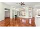 Bright living room featuring a fireplace, built-in shelving, and large windows, perfect for relaxation at 7451 Sw 111Th Pl, Ocala, FL 34476