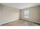 An empty bedroom featuring wood-look floors and a single window at 7821 Sw 55Th Ln, Ocala, FL 34474