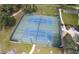 Aerial view of the community tennis and pickleball courts at 8981 Sw Sw 209Th Cir, Dunnellon, FL 34431