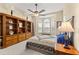 Bedroom featuring a bay window and custom built-in shelving at 9483 Sw 90Th St, Ocala, FL 34481