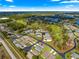 An aerial view highlighting the house location near lakes and a golf course in a quiet neighborhood at 1 Diamond Cove Pl, Ocala, FL 34472