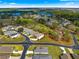 An aerial view of the house with golf course and lakes in the neighborhood at 1 Diamond Cove Pl, Ocala, FL 34472