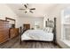 Spacious bedroom with wood-look floors and dual windows for natural light at 1 Diamond Cove Pl, Ocala, FL 34472