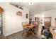 Charming dining room adjacent to living room features wood floors and comfortable seating at 1 Diamond Cove Pl, Ocala, FL 34472