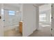 Bathroom featuring a shower-tub combo and a vanity at 10003 Sw 90Th Loop, Ocala, FL 34481