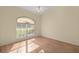 Bedroom with wood floors offers natural light and space for relaxation at 10884 Sw 53Rd Cir, Ocala, FL 34476