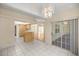 Open-concept eat-in kitchen with tile floor, wood cabinets and lots of natural light at 10884 Sw 53Rd Cir, Ocala, FL 34476