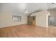 Cozy living space with hardwood floors and abundant natural light, creating a warm and inviting atmosphere at 10884 Sw 53Rd Cir, Ocala, FL 34476