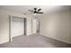 Bedroom with a closet and carpet at 11862 Se 72Nd Terrace Rd, Belleview, FL 34420