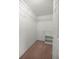 Compact walk-in closet with carpet and ventilated shelving at 11862 Se 72Nd Terrace Rd, Belleview, FL 34420