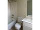 Standard bathroom with tile shower/tub combo, single sink vanity, and tile flooring at 15 Clear Way, Ocala, FL 34472