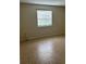 Bedroom featuring tile flooring, a window with blinds, and neutral wall color at 15 Clear Way, Ocala, FL 34472