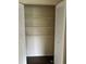 Interior view of closet with white folding doors and shelving at 15 Clear Way, Ocala, FL 34472