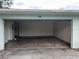 Open garage featuring number 15 above the door at 15 Clear Way, Ocala, FL 34472