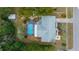 Aerial view of property, showcasing backyard pool, shed, and well-maintained surroundings at 15052 Sw 43Rd Terrace Rd, Ocala, FL 34473