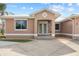 Charming single-story home with a well-manicured lawn, decorative concrete driveway, and stylish entrance at 1621 Yellow Brick Rd, Astor, FL 32102