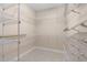 This walk-in closet features an organized shelving system, providing lots of storage at 1621 Yellow Brick Rd, Astor, FL 32102