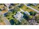 Aerial view of single Gathering home with detached garage and screened in pool at 1712 Ne 40Th Ave, Ocala, FL 34470