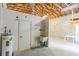 Spacious unfinished basement including sink, water heater, and access to another room at 1712 Ne 40Th Ave, Ocala, FL 34470
