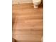 Bathroom featuring wood-look flooring, paired with a white toilet at 1712 Ne 40Th Ave, Ocala, FL 34470
