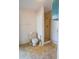 Bathroom featuring a toilet and shower with glass door and vintage tile floor at 1712 Ne 40Th Ave, Ocala, FL 34470