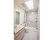 Bathroom with a single vanity and glass enclosed shower with accessibility grab bars and shower bench at 1712 Ne 40Th Ave, Ocala, FL 34470