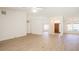 Expansive living room with wood floors, ample natural light, and a welcoming entry way at 1712 Ne 40Th Ave, Ocala, FL 34470