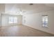 Spacious main bedroom with ample natural light, wood floors, and a ceiling fan at 1712 Ne 40Th Ave, Ocala, FL 34470