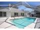 Inviting screened-in pool perfect for relaxation and entertaining, with ample deck space at 1712 Ne 40Th Ave, Ocala, FL 34470