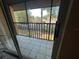 Balcony features tiled floor and outdoor views at 2857 Sw 32Nd Ave, Ocala, FL 34474