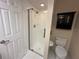 Bathroom showcases a glass-enclosed shower and modern fixtures at 2857 Sw 32Nd Ave, Ocala, FL 34474