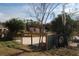 View of a fenced yard with mature trees and a grass covered yard at 3560 Sw 24Th Avenue Rd, Ocala, FL 34471