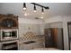 Kitchen showcasing stainless steel appliances, tiled backsplash and white cabinetry at 3560 Sw 24Th Avenue Rd, Ocala, FL 34471