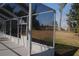 Screened-in pool enclosure offering a view of the backyard and providing a bug-free outdoor living space at 3560 Sw 24Th Avenue Rd, Ocala, FL 34471