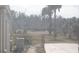 View of the yard from inside the screened porch at 3560 Sw 24Th Avenue Rd, Ocala, FL 34471