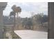 View of the yard from inside the screened porch at 3560 Sw 24Th Avenue Rd, Ocala, FL 34471