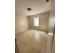 Bedroom featuring tile flooring and a window at 3940 Sw 138Th Pl, Ocala, FL 34473